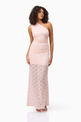 Brunette model wearing CURAAE Armelle Lace Maxi Dress in Pink posed looking away shot