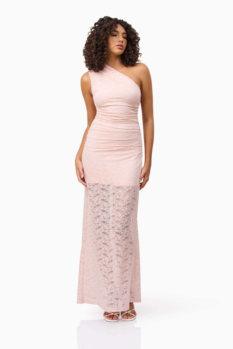 Brunette model wearing CURAAE Armelle Lace Maxi Dress in Pink posed looking away shot