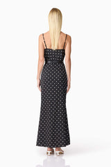 Blonde model wearing Aurellia Cami Top & Skirt Set in Black Polka Dot back shot