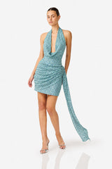 CURAAE Orel Halter Cowl Neck Mini Dress in Blue hand behind hip shot