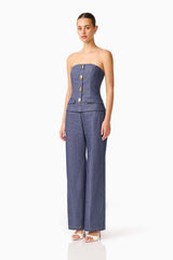 CURAAE Vana Denim Jumpsuit in Blue with strapless neckline & front botton detail side shot 