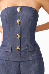 CURAAE Vana Denim Jumpsuit in Blue with strapless neckline & front botton detail detail shot 
