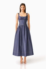 CURAAE Vana Denim Maxi Dress in Blue with scoop neckline & drop waist front shot