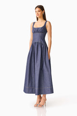 CURAAE Vana Denim Maxi Dress in Blue with scoop neckline & drop waist side shot
