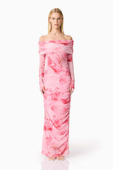 Blonde model wearing CURAAE Rosalia Off The Shoulder Maxi Dress in Pink Floral front shot