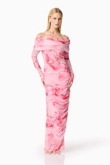 Blonde model wearing CURAAE Rosalia Off The Shoulder Maxi Dress in Pink Floral posed shot