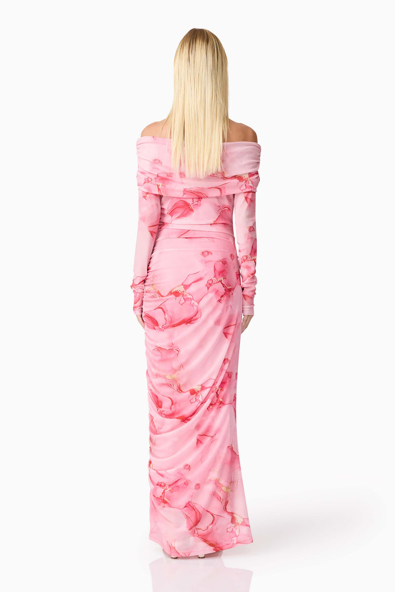 Blonde model wearing CURAAE Rosalia Off The Shoulder Maxi Dress in Pink Floral back shot