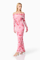 Blonde model wearing CURAAE Rosalia Off The Shoulder Maxi Dress in Pink Floral posed walking shot