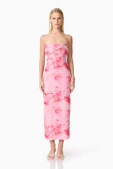 Brunette model wearing CURAAE Rosalia Strapless Midi Dress in Pink Floral front shot