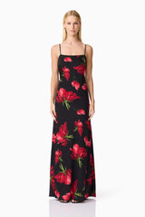 Blonde model wearing CURAAE Valetta Floral Maxi Dress in Black & Red front shot
