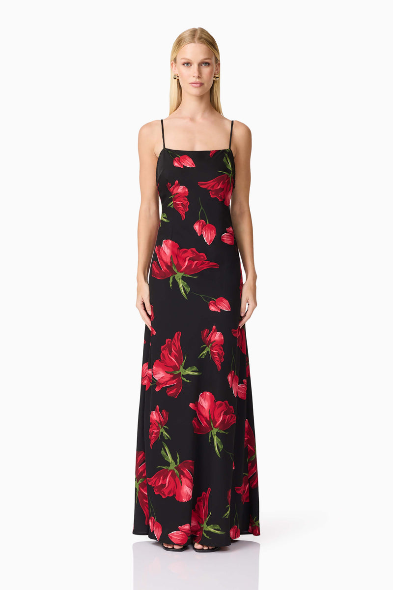 Blonde model wearing CURAAE Valetta Floral Maxi Dress in Black & Red front shot