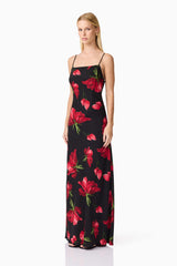 Blonde model wearing CURAAE Valetta Floral Maxi Dress in Black & Red side shot
