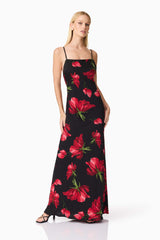 Blonde model wearing CURAAE Valetta Floral Maxi Dress in Black & Red posed shot