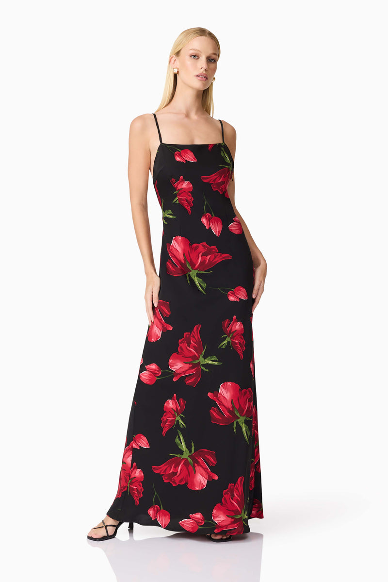 Blonde model wearing CURAAE Valetta Floral Maxi Dress in Black & Red posed shot