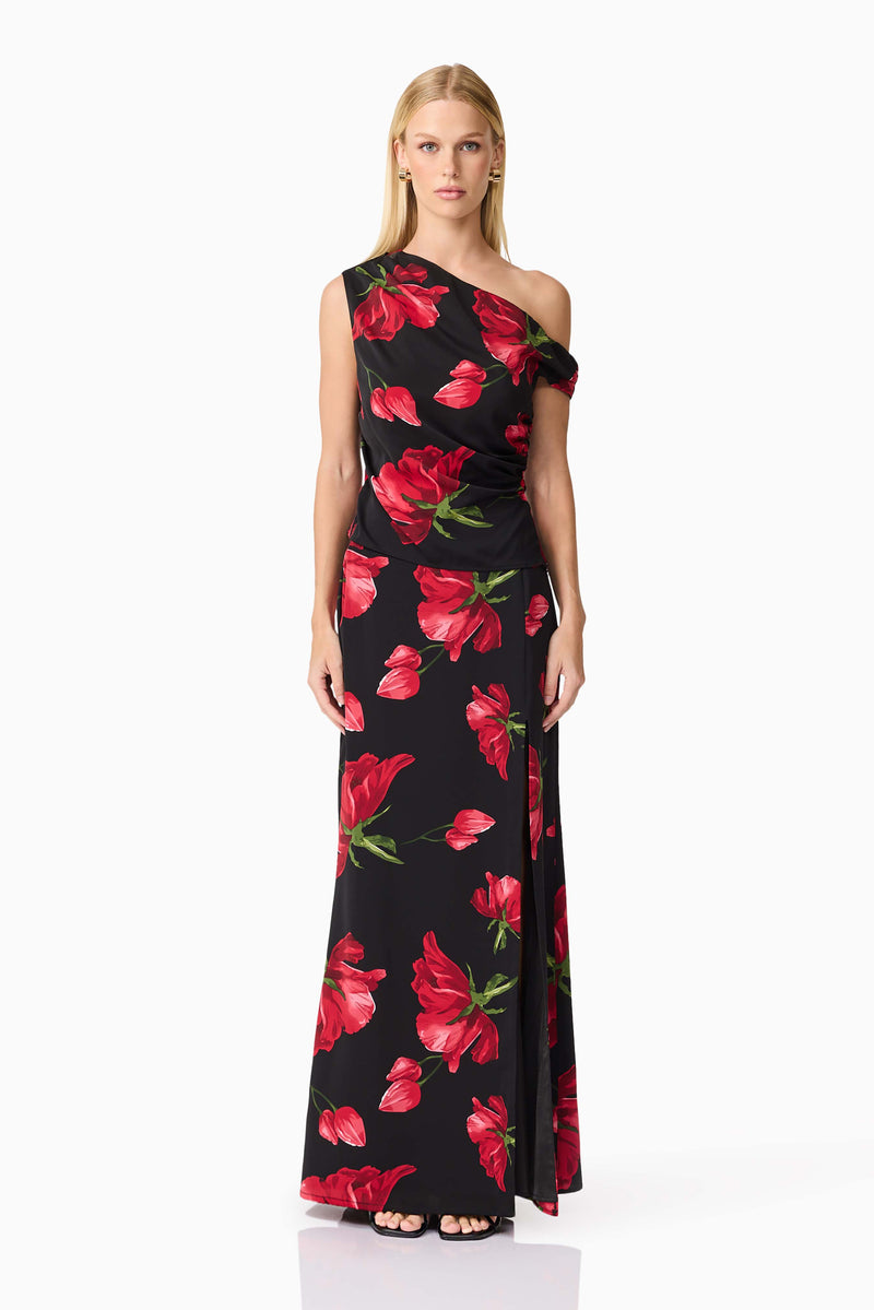 Blonde model wearing CURAAE Valetta Floral Set in Black & Red front shot