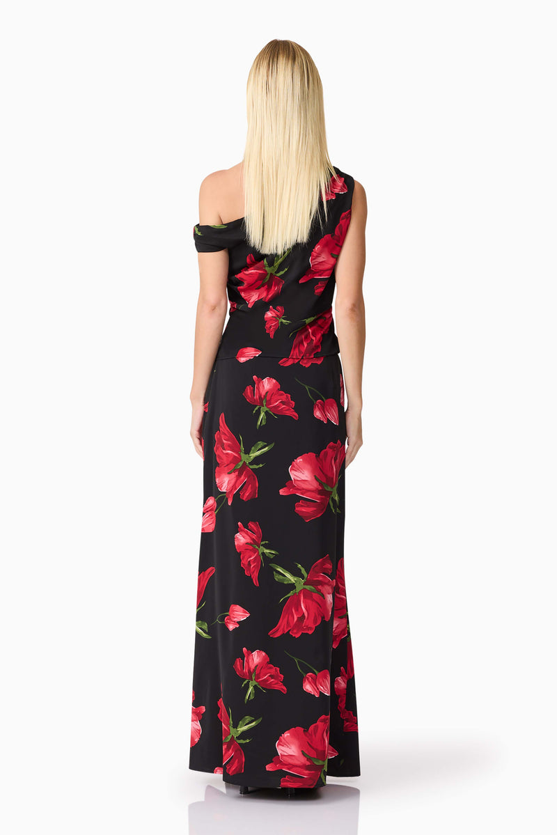 Blonde model wearing CURAAE Valetta Floral Set in Black & Red back shot
