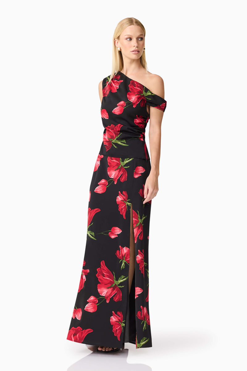 Blonde model wearing CURAAE Valetta Floral Set in Black & Red posed looking away shot