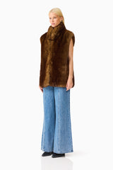 Brunette model wearing the Winona Vest in Brown side shot