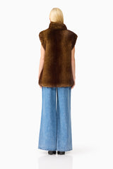 Brunette model wearing the Winona Vest in Brown back shot
