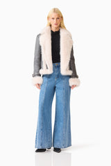Brunette model wearing the Isolda Jacket in Grey posed front shot