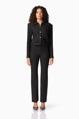 Brunette model wearing CURAAE Nora Jacket & Pants Set in Black front shot