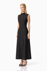 Blonde model wearing CURAAE Nora Sleeveless Midi Dress in Black side shot