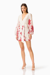 CURAAE Viva Long Sleeve Mini Dress in White and Red with long sleeves & v-neckline posed shot