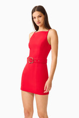 CURAAE Aris Mini Dress in Red with Boat Neckline and Belt Buckle Close Up Posed Shot