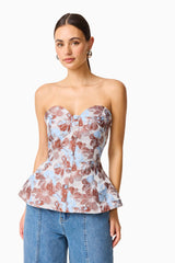 CURAAE Bloomette Strapless Top in Brown and Blue Floral with flared hem close up