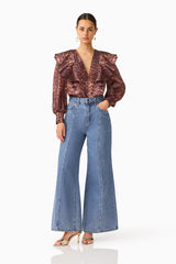 CURAAE Zamira Bell Sleeve Blouse in Brown Multi with ruffle design detailing & long balloon sleeves posed shot
