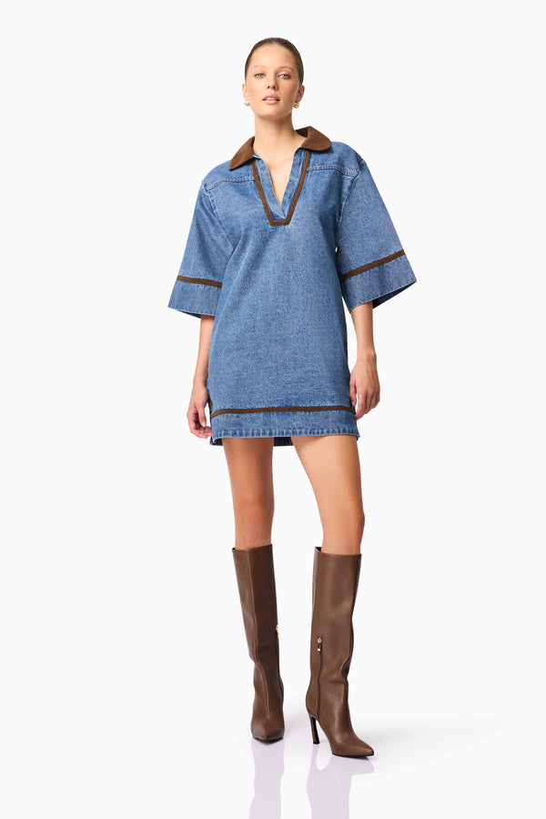 Blonde model wearing CURAAE Rhea Denim Shirt Dress posed