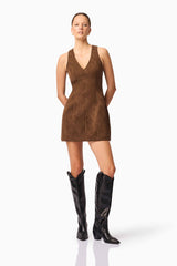 Blonde model wearing CURAAE Venus Suede Mini Dress in Brown posed 2