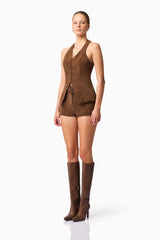 Blonde model wearing CURAAE Venus Suede Set in Brown side pose