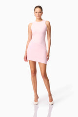 Blonde model wearing CURAAE Zahara Mini Dress in Pink posed