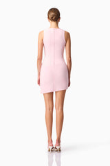 Blonde model wearing CURAAE Zahara Mini Dress in Pink back pose