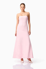 Blonde model wears CURAAE Zahara Strapless Maxi Dress in Pink posed