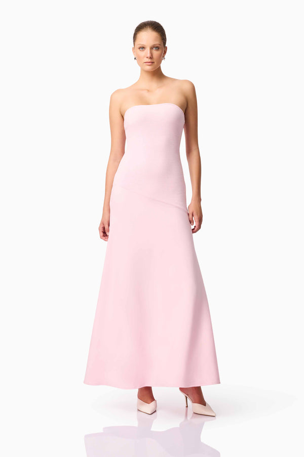 Blonde model wears CURAAE Zahara Strapless Maxi Dress in Pink posed