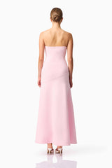 Blonde model wears CURAAE Zahara Strapless Maxi Dress in Pink back pose