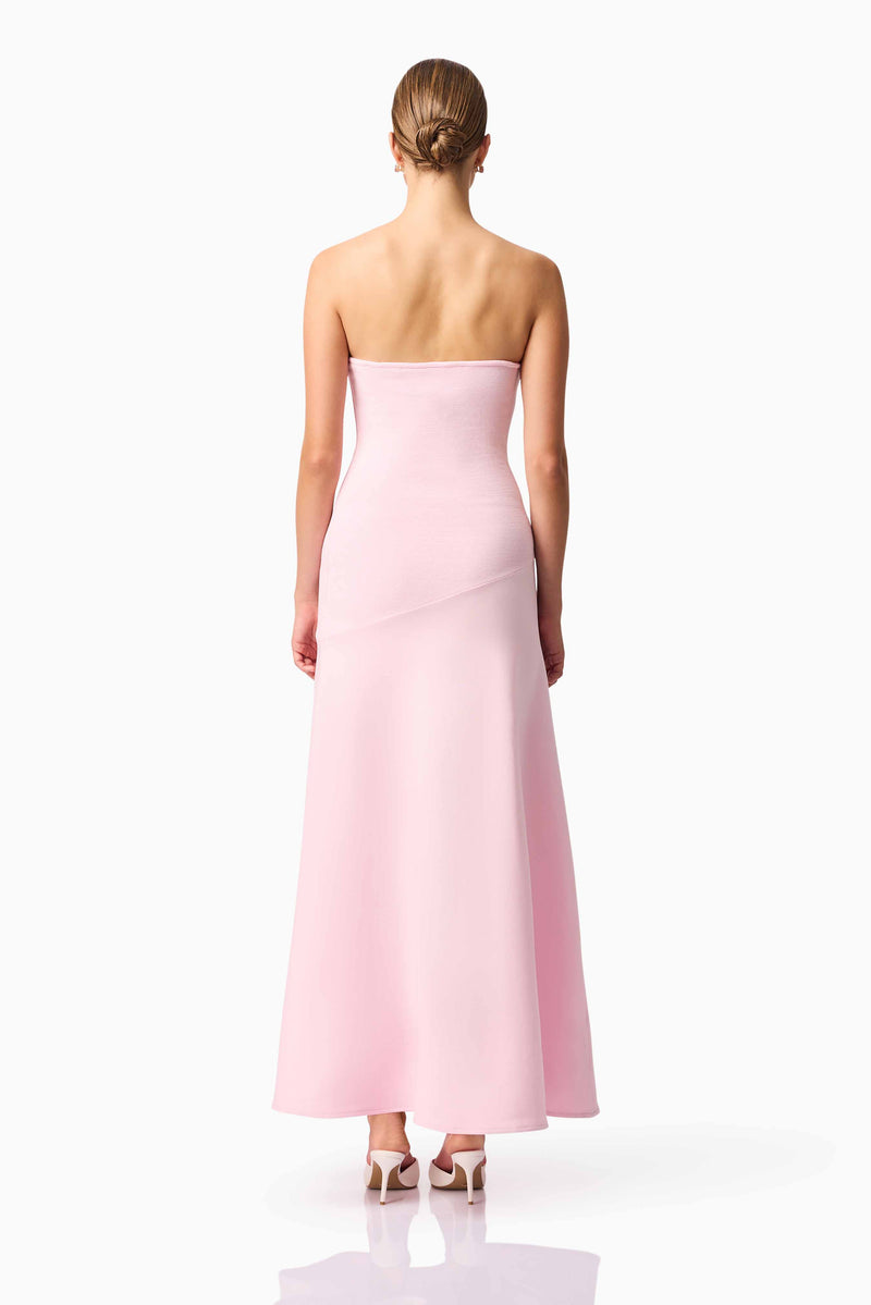 Blonde model wears CURAAE Zahara Strapless Maxi Dress in Pink back pose