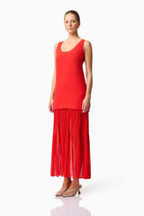 Blonde model wearing CURAAE Etoile Maxi Dress in Red side pose