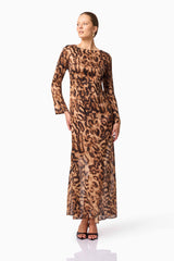 Blonde Model wearing CURAAE Zali Long Sleeve Maxi Dress in Leopard Print Posed