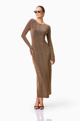 Blonde model wearing CURAAE Emery Long Sleeve Maxi Dress in Gold posed