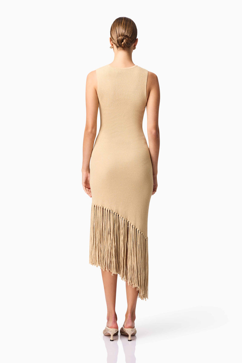 Brunette model wearing Selah Asymmetrical Midi Dress in Beige Back Shot