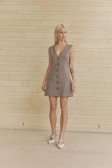 Blonde model wearing Siena V Neck Mini Dress posed shot