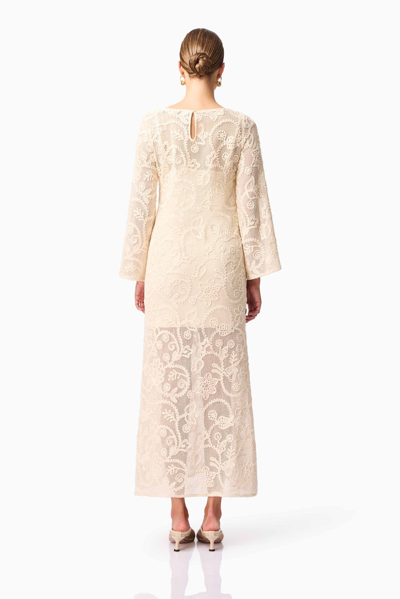 Brunette model wearing Valentine Long Sleeve Maxi Dress in Beige Back Shot