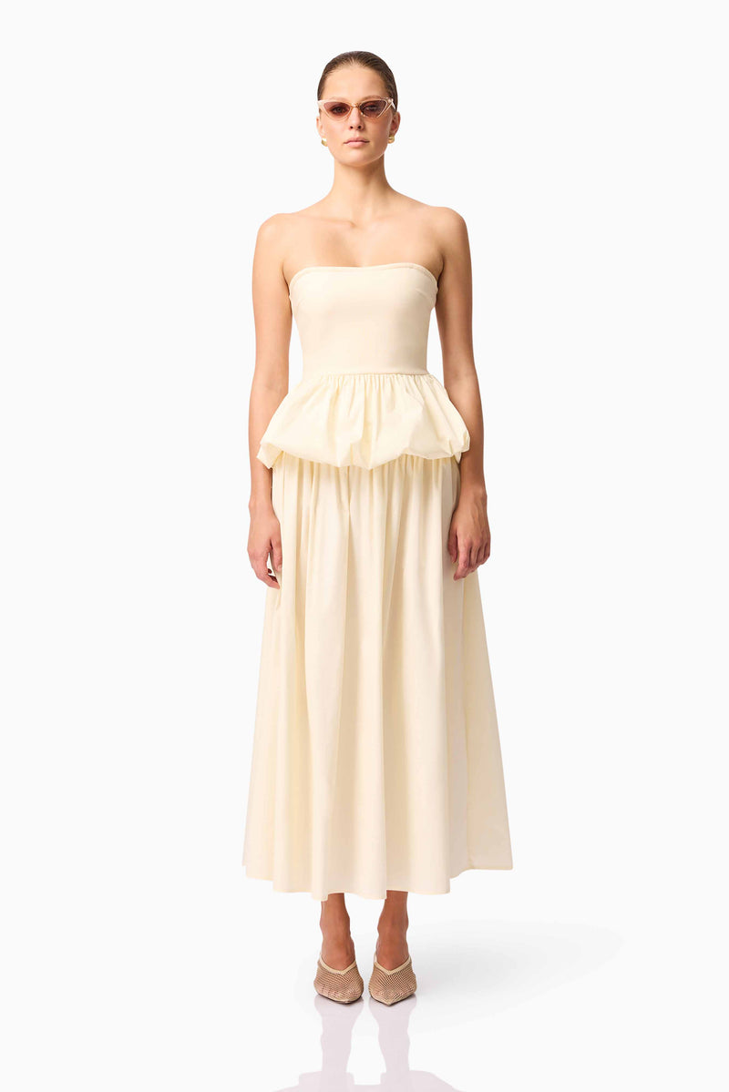 Brunette model wearing Delia Top & Skirt Set in White front shot