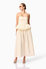 Brunette model wearing Delia Top & Skirt Set in White posed shot