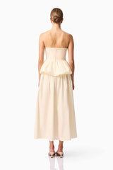 Brunette model wearing Delia Top & Skirt Set in White back shot