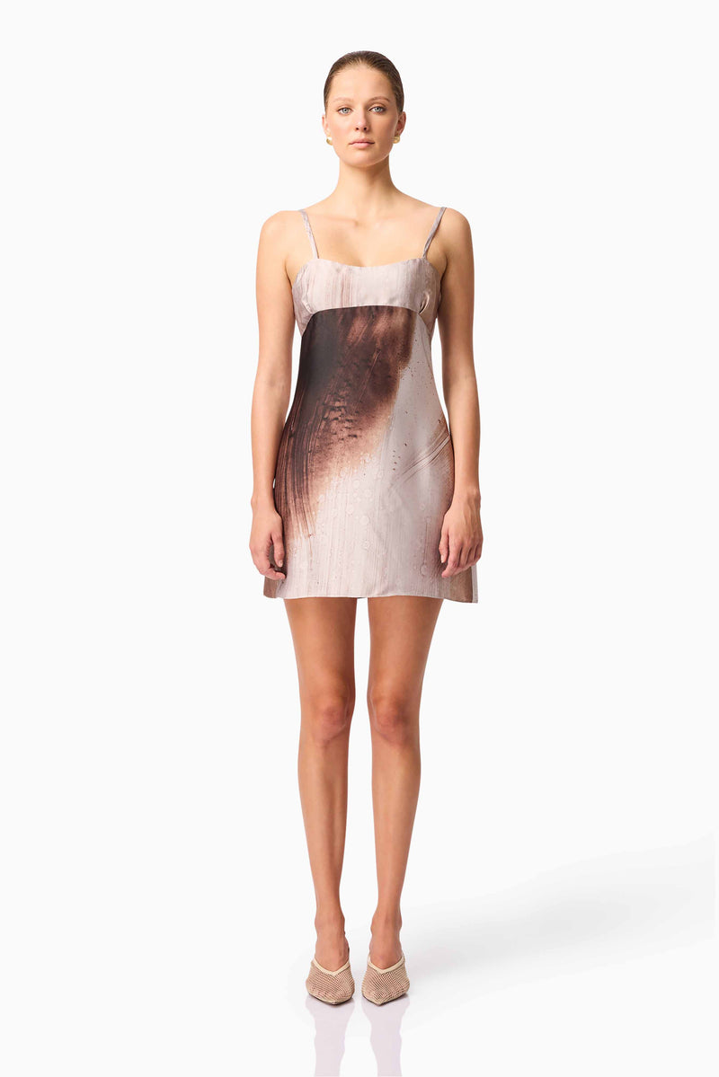 Brunette model wearing Oriellie Sleeveless Mini Dress in Brown Front Shot