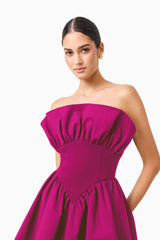 CURAAE Sabella Mini Dress in Magenta Pink with a strapless neckline close up shot 
